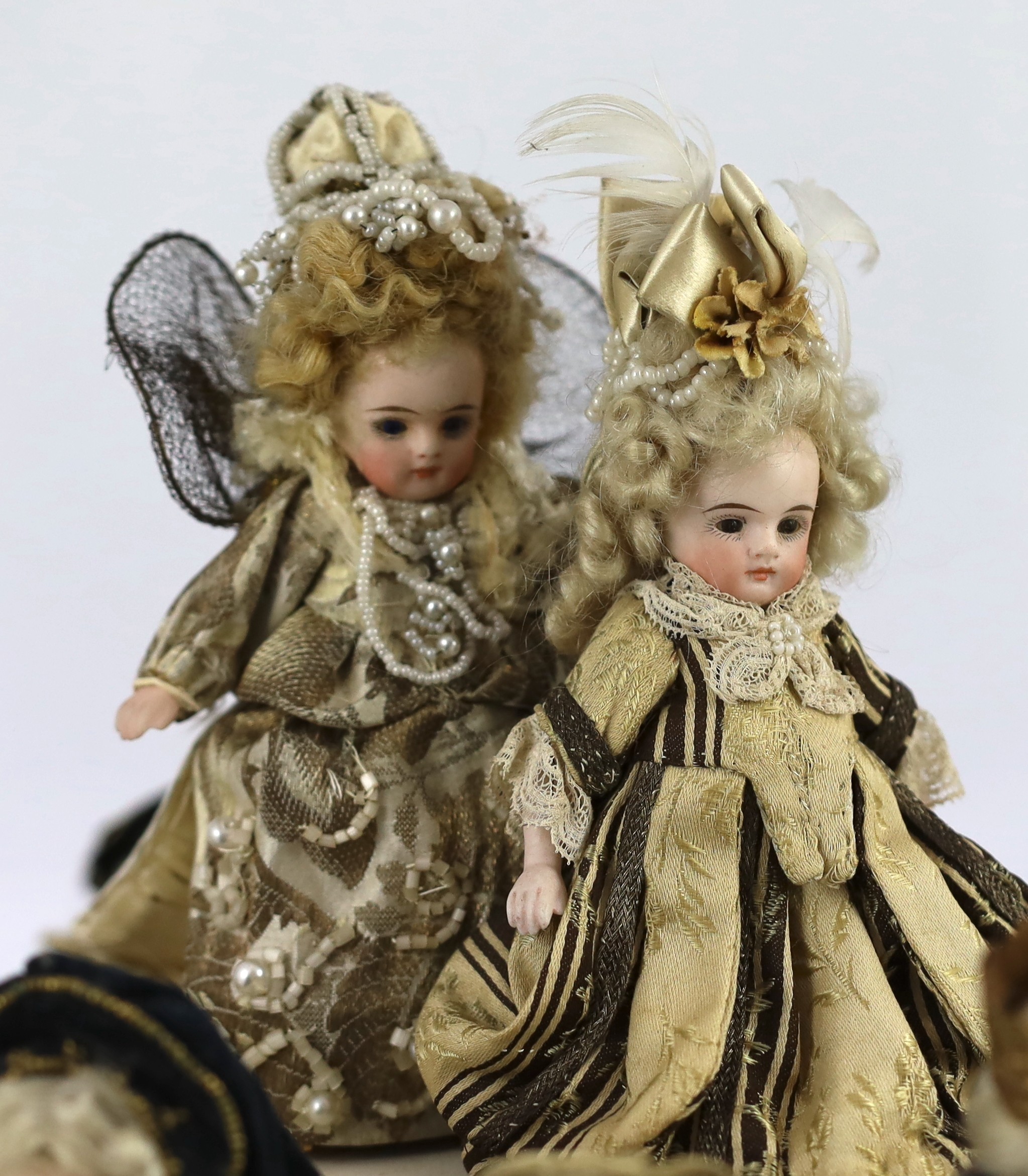 A rare collection of twenty-three German all-bisque dolls, circa 1910